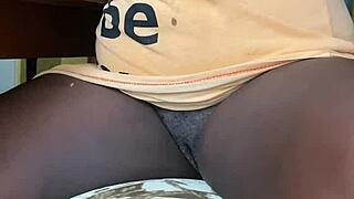 ebony woman flashes her curves