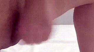 shemale strokes monster cock solo on webcam bed