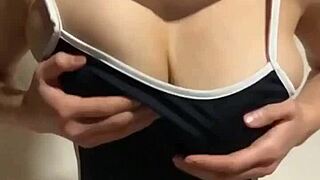 Busty asian plays own boobs slowmotion