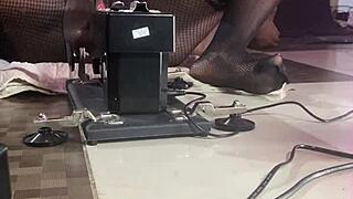 Black pornstar fucks sex machine with smooth operator