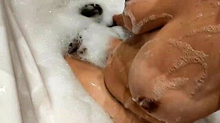 big tits babe in bathroom shows off