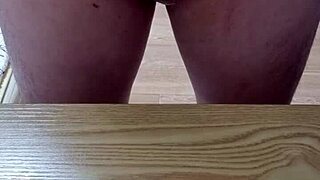 Inserting silicone toy into dick with massager
