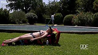 Busty redhead fucks pool boy during summer by the pool