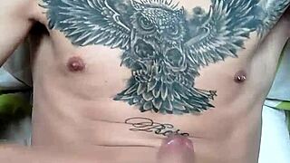 Andrwbyps strokes her tattooed teen pussy solo