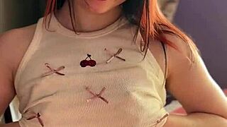 Natural redhead shows her body with socks