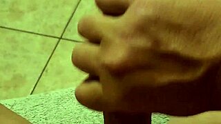 close up handjob on naked cock