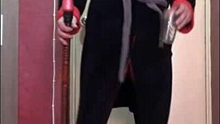 Bisexual crossdresser pissing in glass on dildo and drinks cum