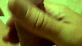 close up handjob on naked cock