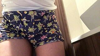 karon191 changes into trunks in the toilet quietly