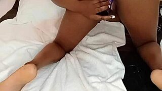 mature woman enjoys solo toy time with oil and spread